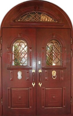 Стальная арочная дверь со стеклом и ковкой ДА-30 в дом из кирпича в Дубне