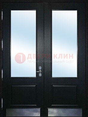Черная двухстворчатая металлическая дверь со стеклом ДС-25 в Дубне