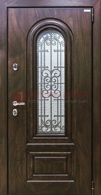 Темная филенчатая железная дверь со стеклом и ковкой ДСК-102 в Дубне