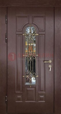 Темная железная дверь со стеклом и ковкой для частного дома ДСК-156 в Кубинке