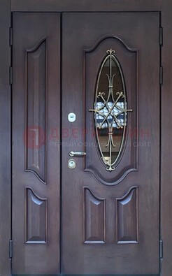 Темная металлическая дверь Винорит со стеклом и ковкой ДСК-239 в Дубне